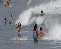 Popular activities at the beach include swimming, Popular activities at the beach include swimming, sunbathing, beach walking, picnicking, and surfing. Jogging, bicycling, and playing volleyball alon